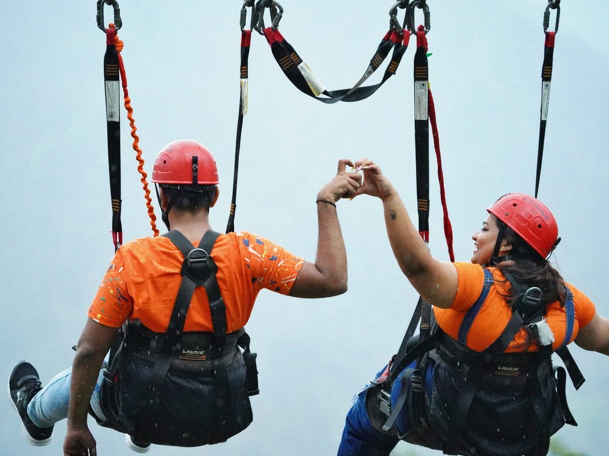 The giant swing arcing out over the Shivpuri valley near Rishikesh