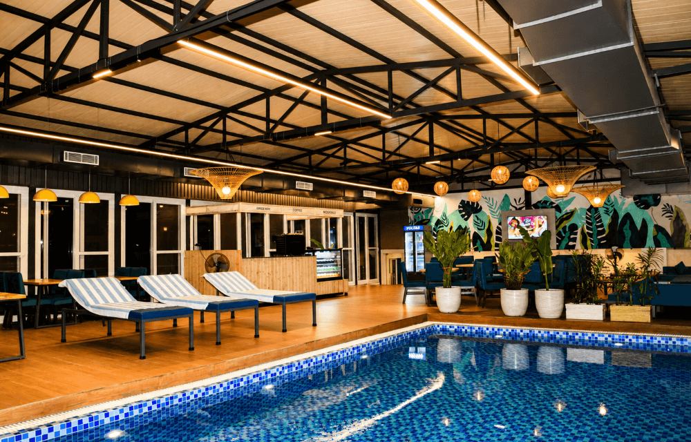 Loungers by the rooftop swimming pool at Arista Haven, Tapovan, Rishikesh