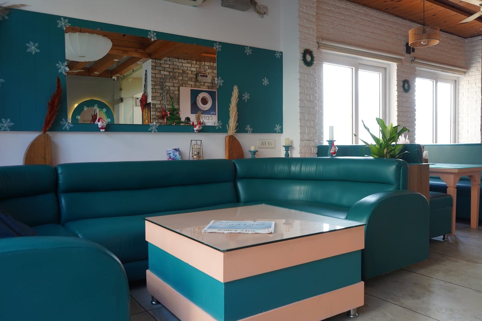 The lounge seating area at Aroma Cafe Hotel, Rishikesh