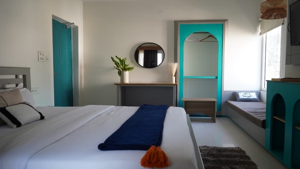 Deluxe Room with Balcony at Aroma Cafe Hotel, Rishikesh