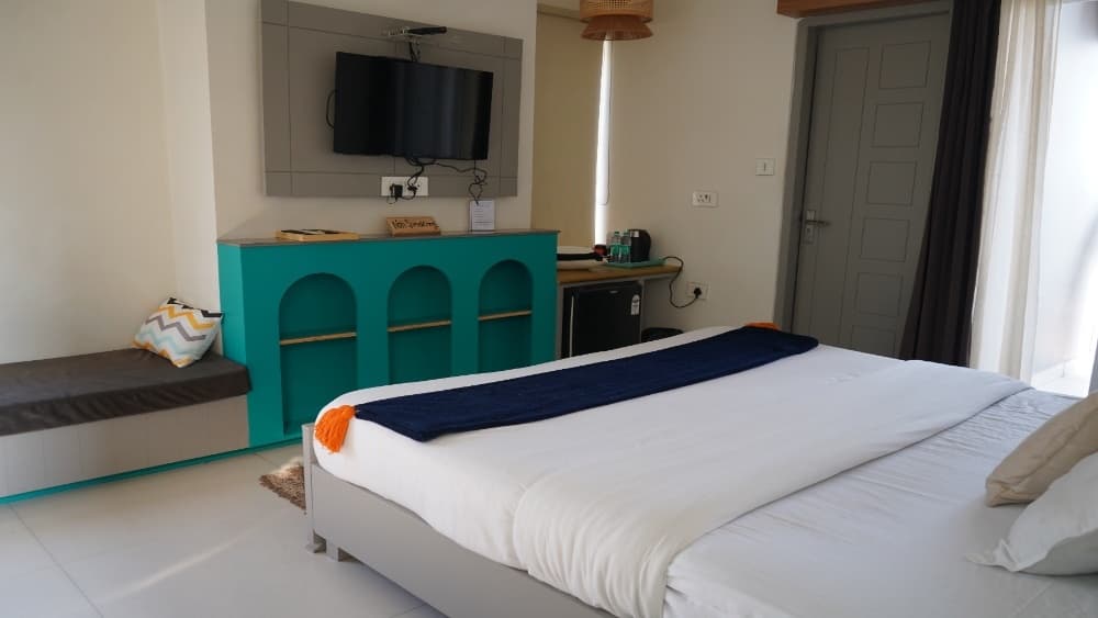 Deluxe Room with Balcony at Aroma Cafe Hotel, Rishikesh