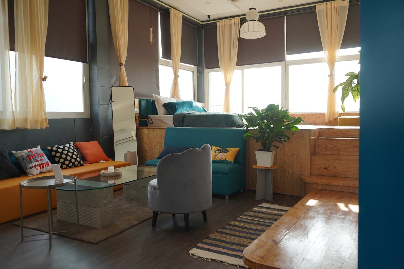 The Loft room's lounge area at Aroma Cafe Hotel, Rishikesh