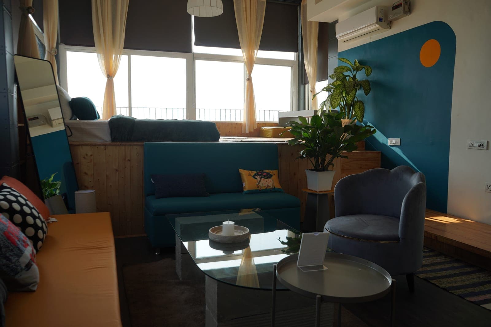The Loft room's living area at Aroma Cafe Hotel, Rishikesh