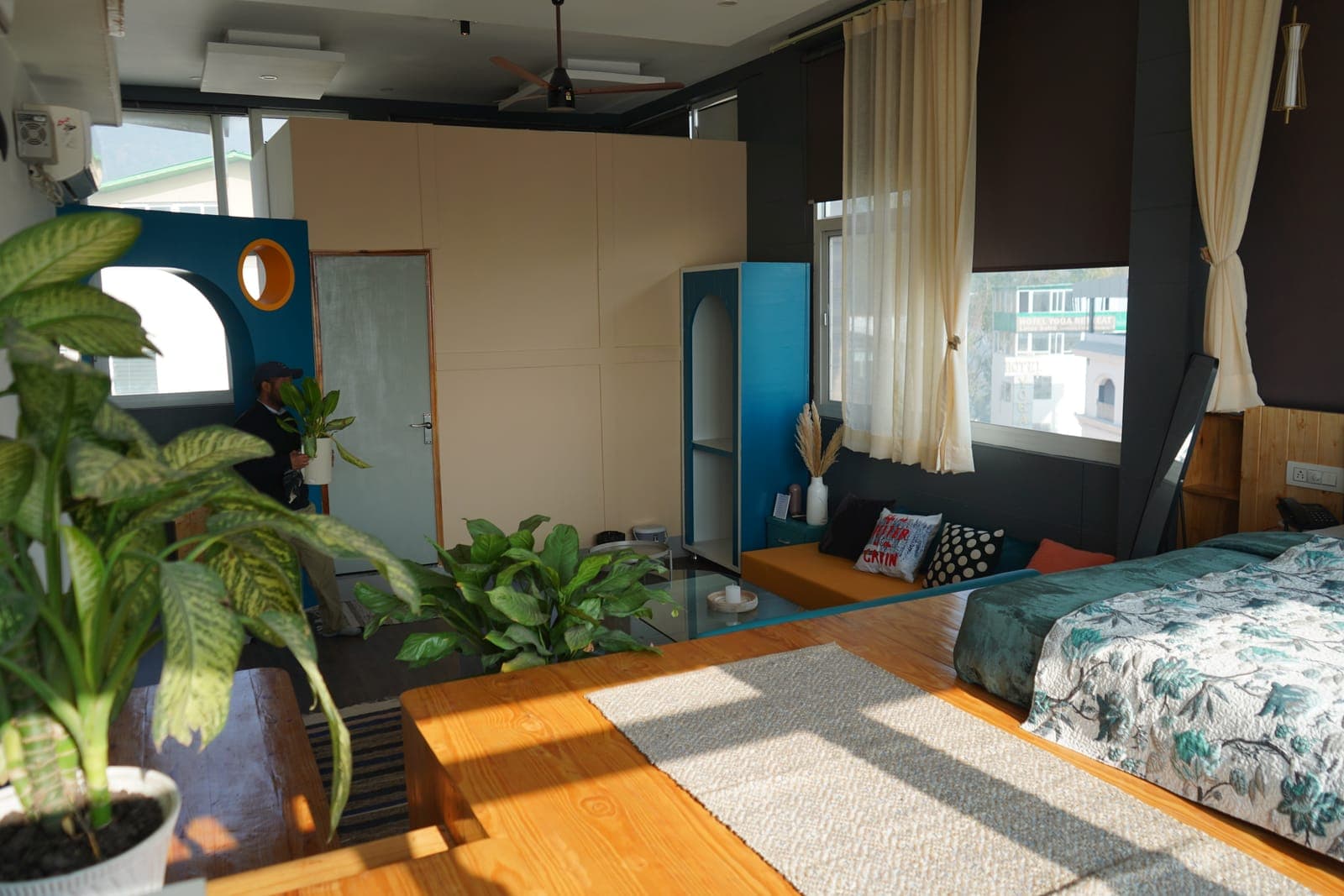 A wide view of the Loft room at Aroma Cafe Hotel, Rishikesh