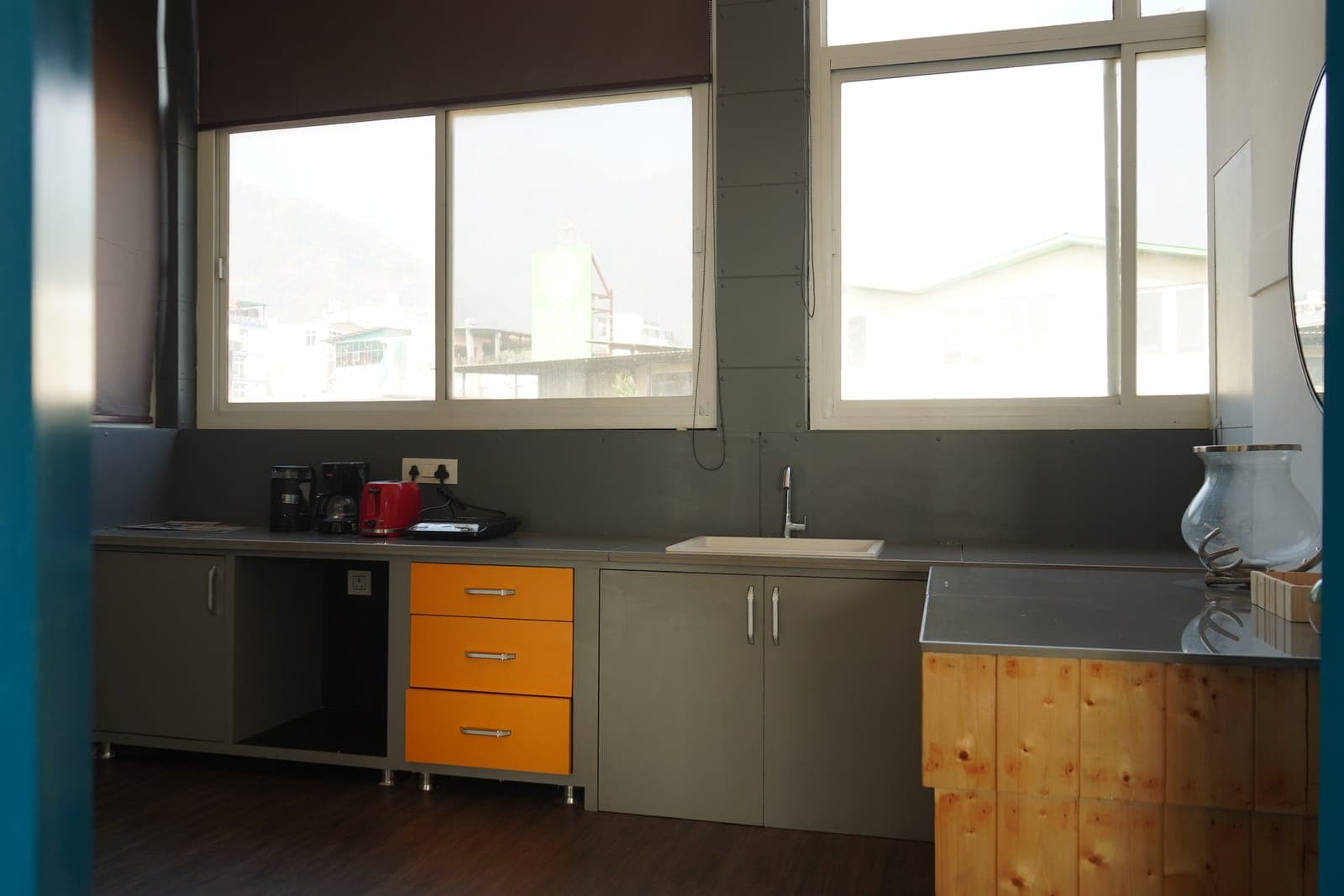 The Loft room's kitchenette at Aroma Cafe Hotel, Rishikesh