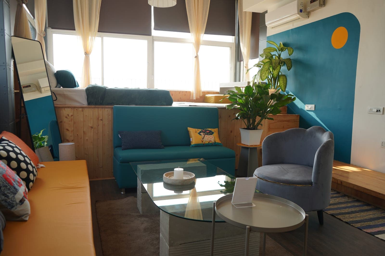 The Loft room's bed at Aroma Cafe Hotel, Rishikesh