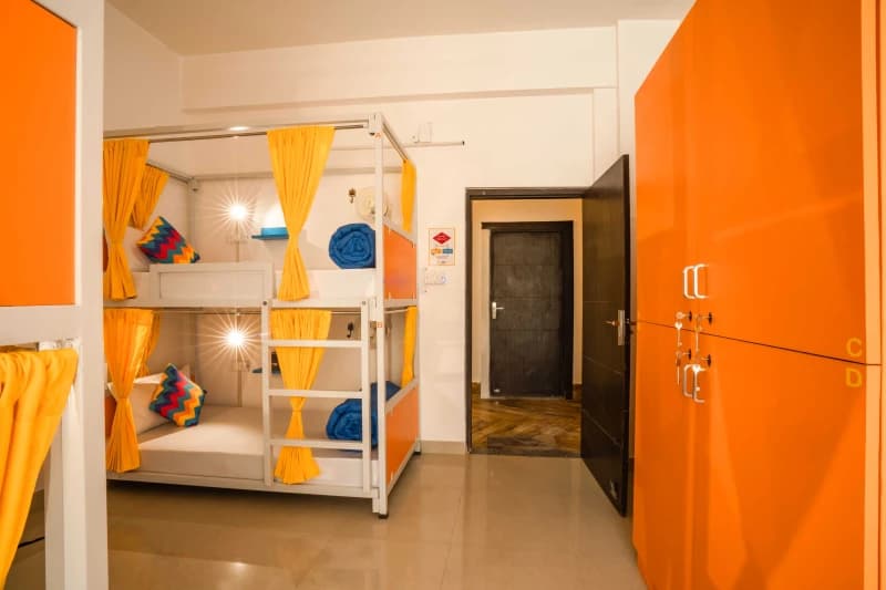 Inside the AC 4-Bed Mixed Dorm — Ensuite at goSTOPS Rishikesh, Lakshman Jhula