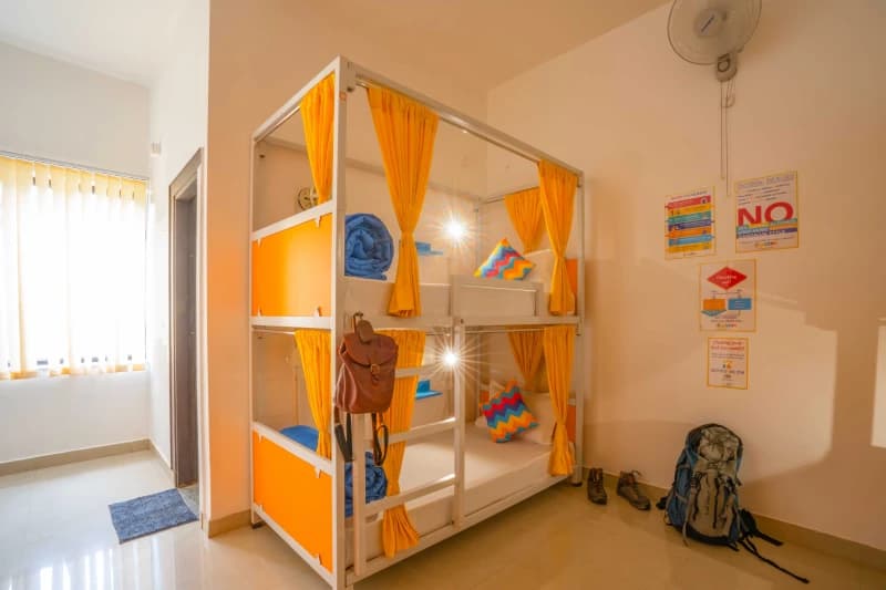 Bunks in the AC 4-Bed Mixed Dorm — Ensuite at goSTOPS Rishikesh, Lakshman Jhula