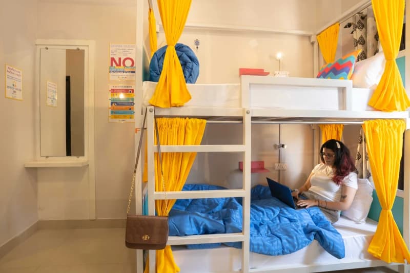 Inside the AC 6-Bed Mixed Dorm — Ensuite at goSTOPS Rishikesh, Lakshman Jhula