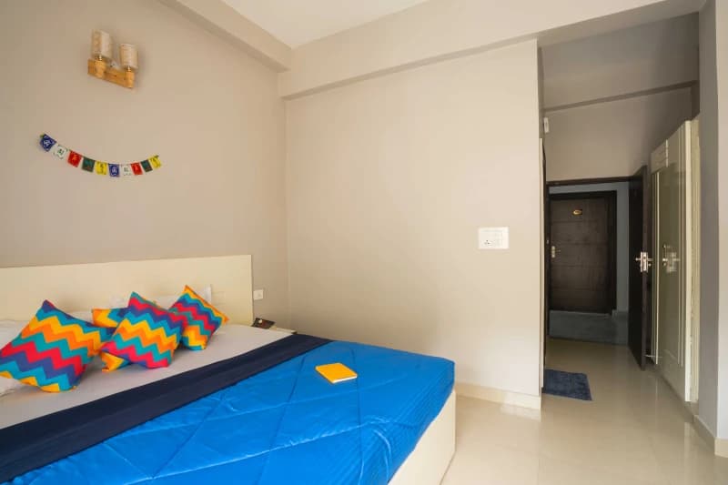 Inside the Deluxe Private AC Room — Ensuite at goSTOPS Rishikesh, Lakshman Jhula