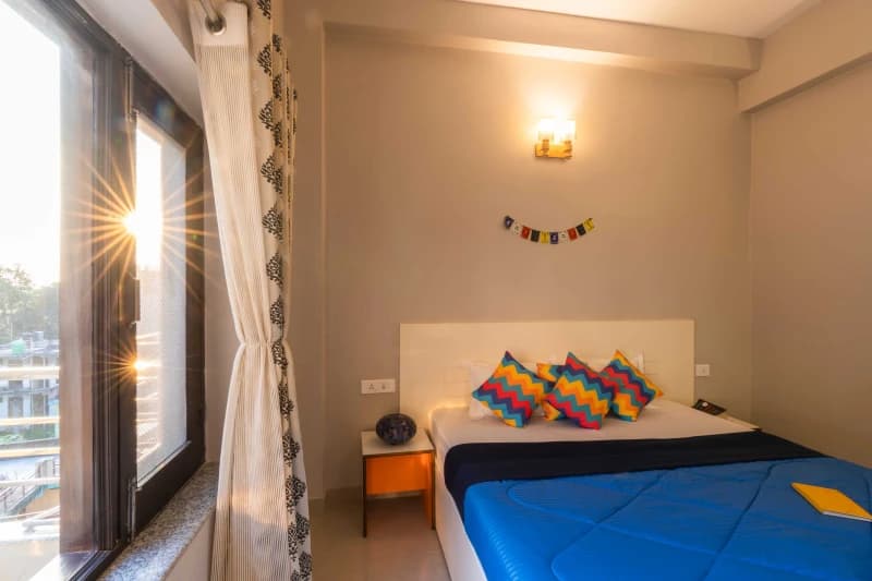 Entrance to the Deluxe Private AC Room — Ensuite at goSTOPS Rishikesh, Lakshman Jhula