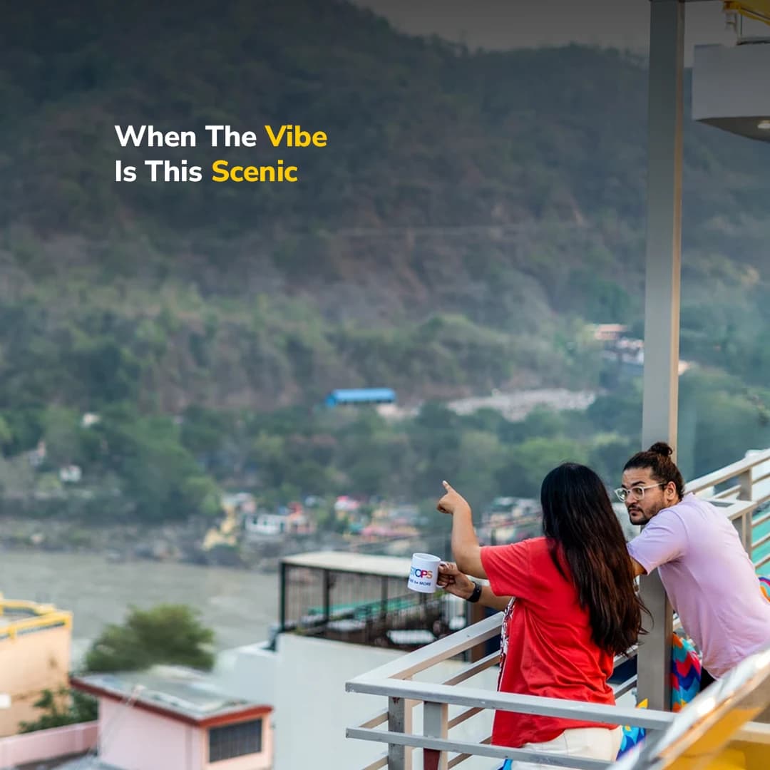 View over Rishikesh and the Ganga from a common balcony at goSTOPS Rishikesh, Tapovan PLUS