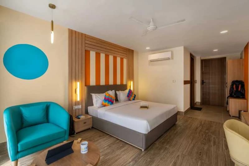Inside the AC Deluxe Private Room — Balcony, Ensuite at goSTOPS Rishikesh, Tapovan PLUS