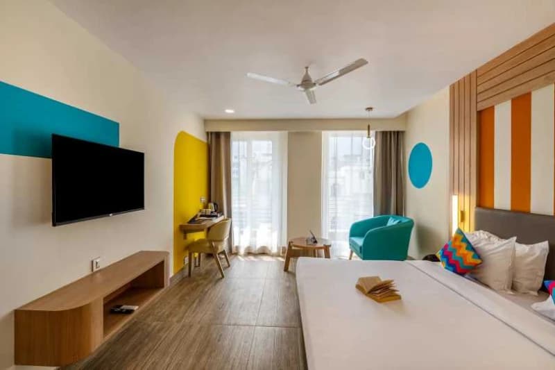 Inside the AC Deluxe Private Room — Balcony, Ensuite at goSTOPS Rishikesh, Tapovan PLUS