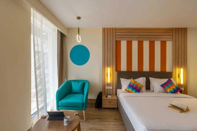 Inside the AC Deluxe Private Room — Balcony, Ensuite at goSTOPS Rishikesh, Tapovan PLUS