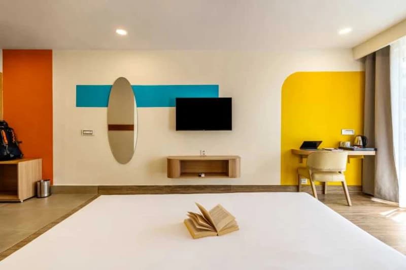 Inside the AC Deluxe Private Room — Balcony, Ensuite at goSTOPS Rishikesh, Tapovan PLUS