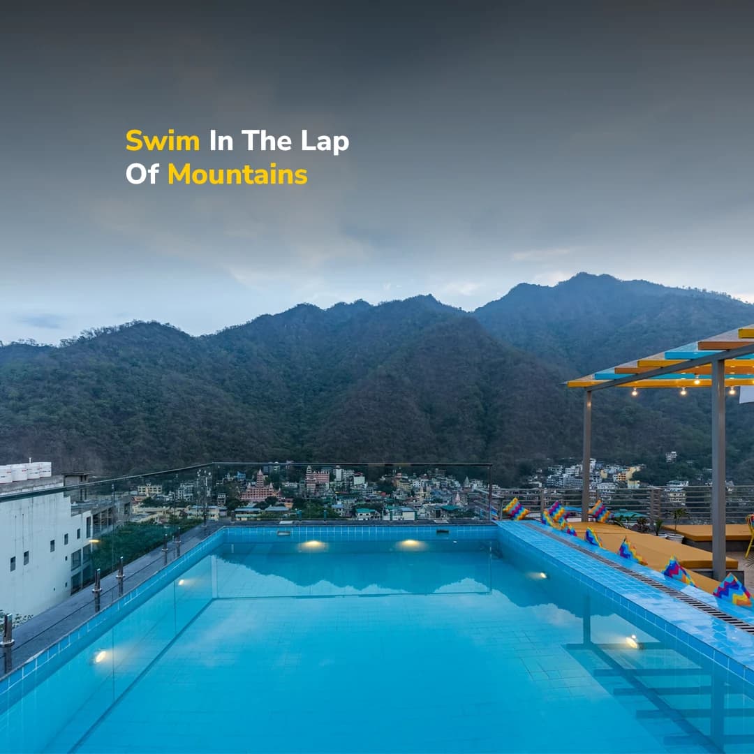 Rooftop swimming pool with mountain views at goSTOPS Rishikesh, Tapovan PLUS