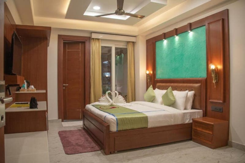 The balcony door of the Premium Room with Balcony at Holy Shivana, Rishikesh