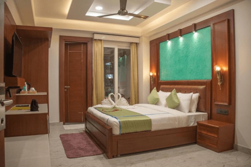 The balcony door of the Premium Room with Balcony at Holy Shivana, Rishikesh