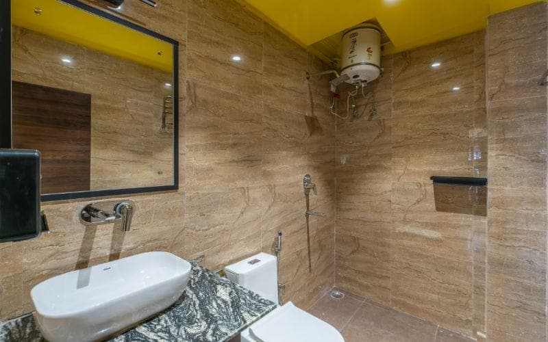 En-suite bathroom for the 4-Bed Mixed Dorm (AC) at The Hosteller Rishikesh, Ganges
