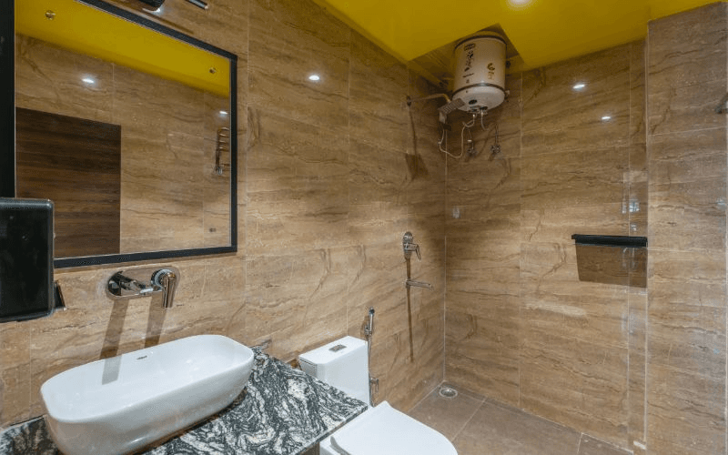 En-suite bathroom for the AC 4-Bed Mixed Dorm at The Hosteller Rishikesh, Ganges
