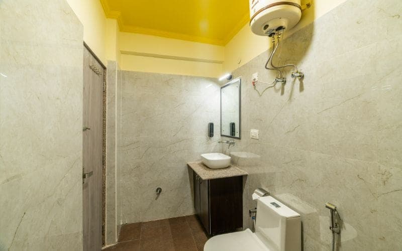 En-suite bathroom for the 8-Bed Mixed Dorm (AC) at The Hosteller Rishikesh, Ganges