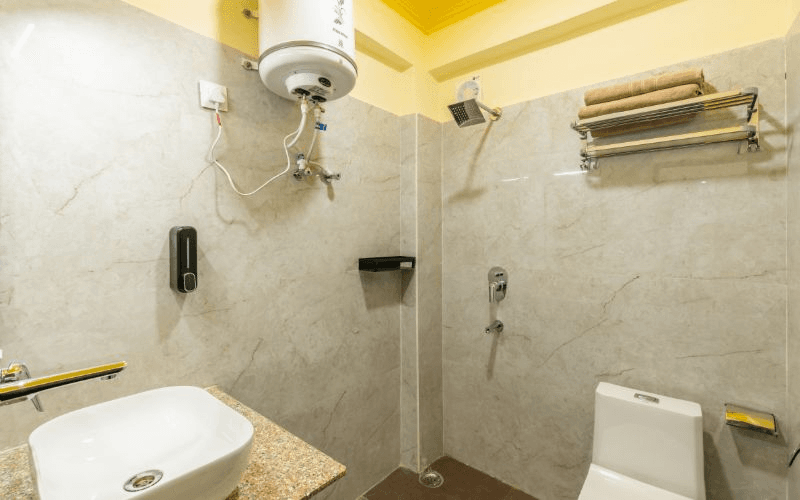 En-suite bathroom for the AC Deluxe Double Room at The Hosteller Rishikesh, Ganges