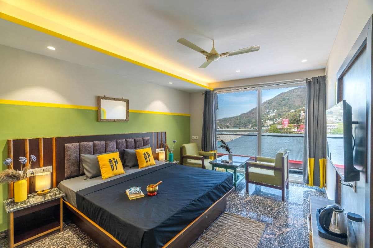 A room with river and mountain views at The Hosteller Rishikesh, Ganges