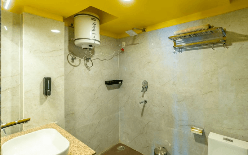En-suite bathroom for the AC Superior Double Room at The Hosteller Rishikesh, Ganges