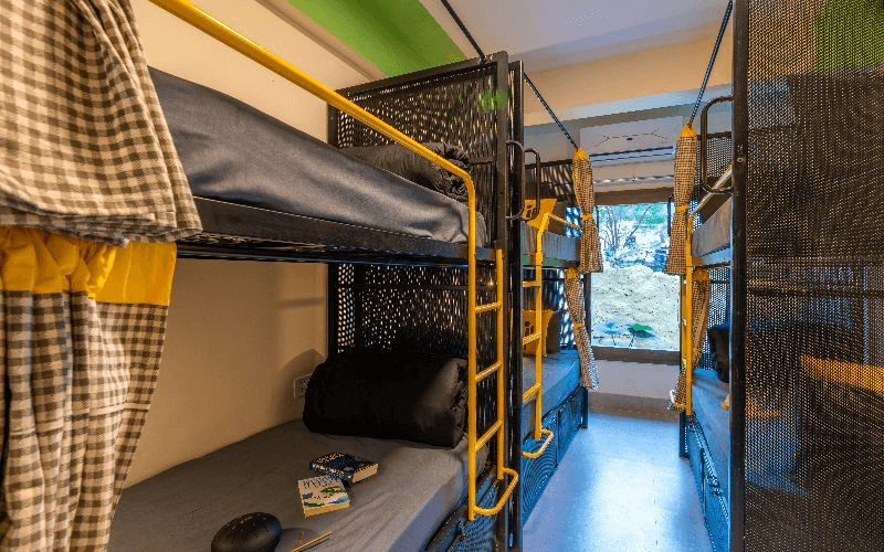 Inside the AC 4-Bed Mixed Dorm — Balcony, Hill View at The Hosteller Rishikesh, Laxman Jhula