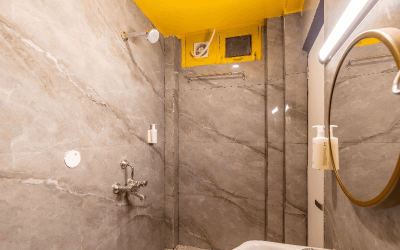 En-suite bathroom for the AC 8-Bed Mixed Dorm at The Hosteller Rishikesh, Laxman Jhula