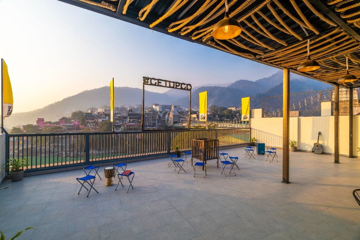 Rooftop seating area at The Hosteller Rishikesh, Laxman Jhula
