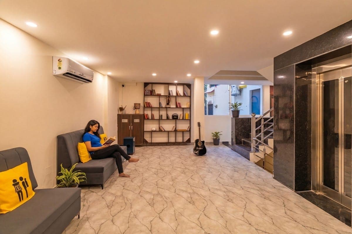 Ground-floor common area and reception at The Hosteller Rishikesh, Laxman Jhula