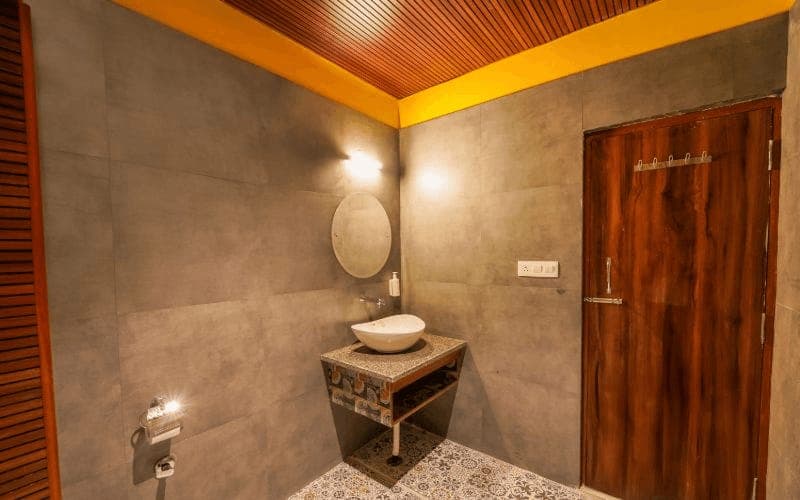 En-suite bathroom for the 10-Bed Mixed Dorm (Balcony, AC) at The Hosteller Rishikesh, Upper Tapovan