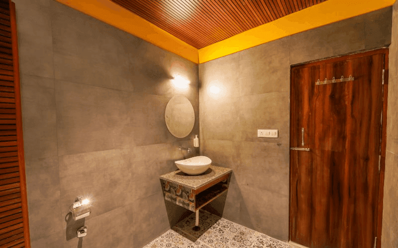En-suite bathroom for the AC 10-Bed Dorm — Balcony at The Hosteller Rishikesh, Upper Tapovan