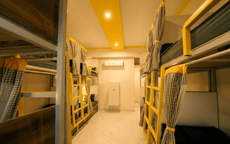 Inside the 10-Bed Mixed Dorm (Balcony, AC) at The Hosteller Rishikesh, Upper Tapovan