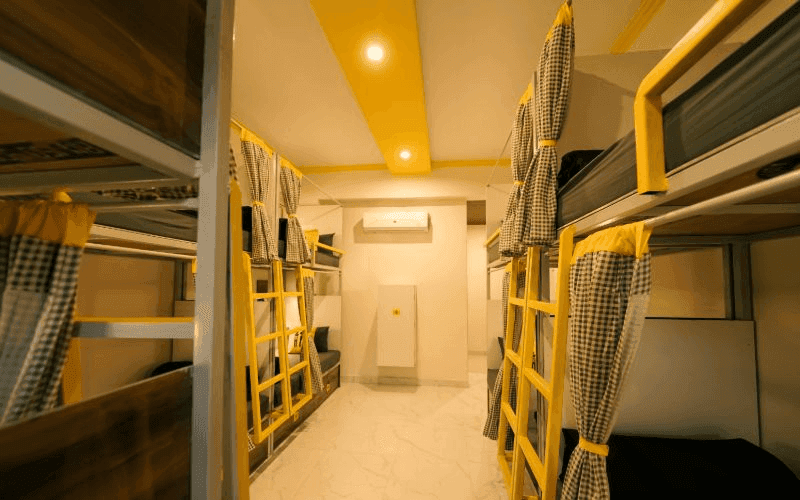 Inside the AC 10-Bed Dorm — Balcony at The Hosteller Rishikesh, Upper Tapovan