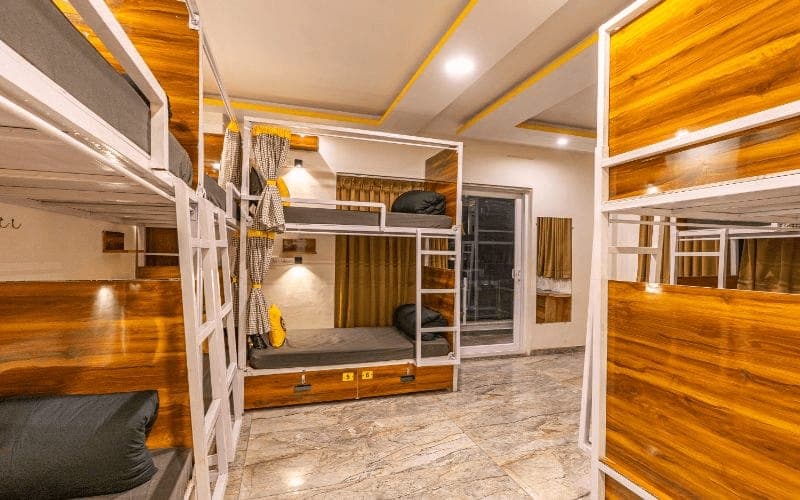Inside the 10-Bed Mixed Dorm (Mountain View, AC) at The Hosteller Rishikesh, Upper Tapovan