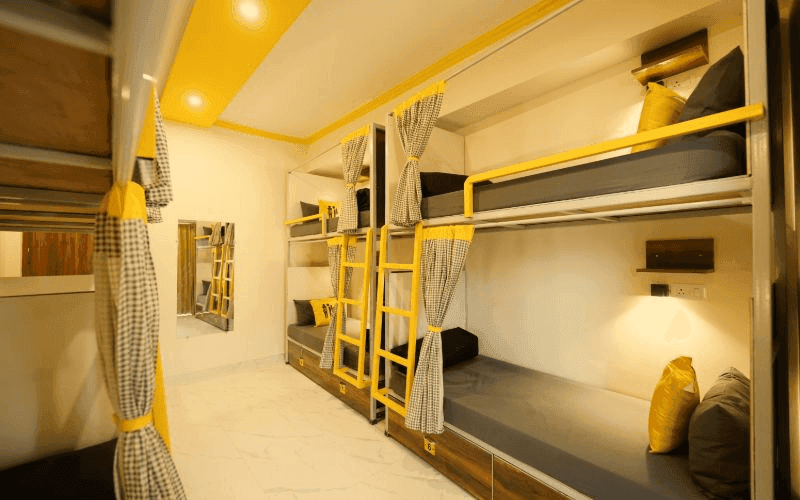 Inside the AC 8-Bed Dorm — Balcony at The Hosteller Rishikesh, Upper Tapovan
