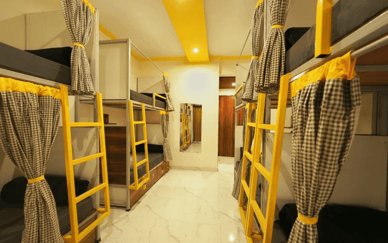Inside the AC 8-Bed Dorm — Balcony at The Hosteller Rishikesh, Upper Tapovan