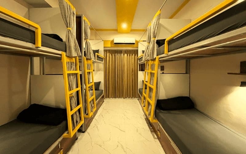 Inside the 8-Bed Mixed Dorm (Balcony, AC) at The Hosteller Rishikesh, Upper Tapovan