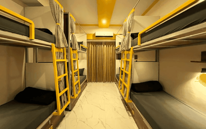 Inside the AC 8-Bed Dorm — Balcony at The Hosteller Rishikesh, Upper Tapovan