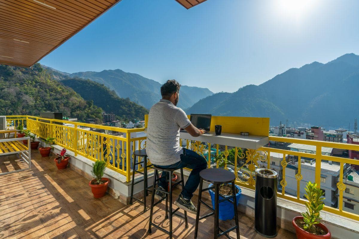 Rooftop workspace with mountain views at The Hosteller Rishikesh, Upper Tapovan
