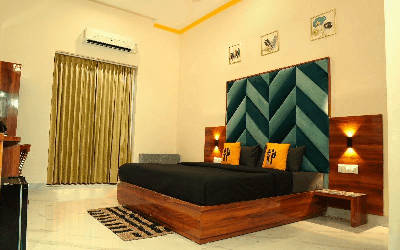 Inside the AC Superior Double Room — Balcony at The Hosteller Rishikesh, Upper Tapovan