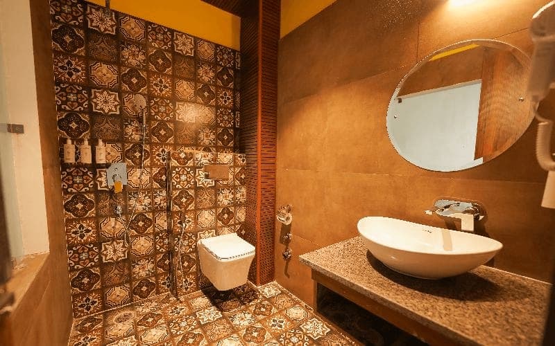 En-suite bathroom for the Superior Double Room (Balcony, AC) at The Hosteller Rishikesh, Upper Tapovan
