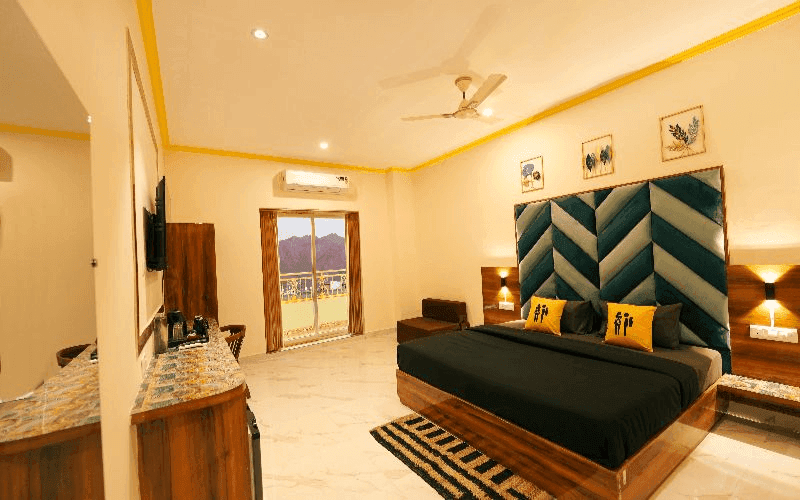 Inside the AC Superior Double Room — Balcony at The Hosteller Rishikesh, Upper Tapovan