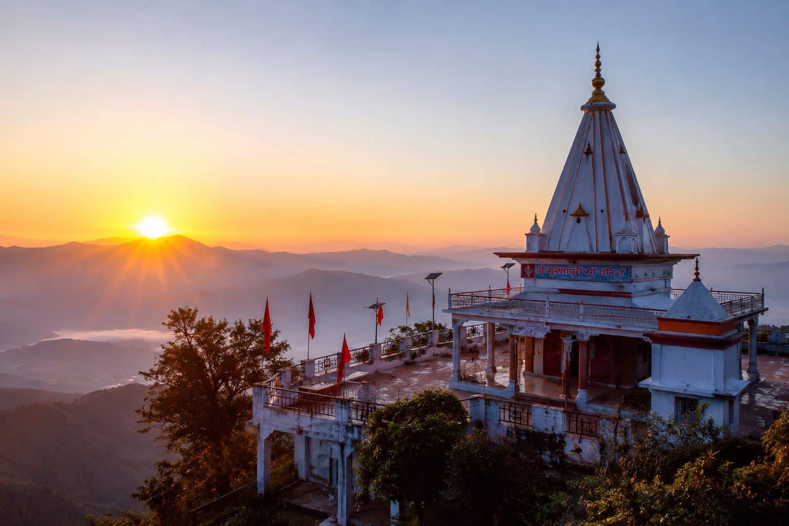 Sunrise over the Himalayan peaks from Kunjapuri Temple